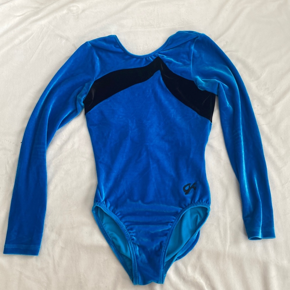 Long-sleeve GK Elite blue velvet gymnastics leotard.